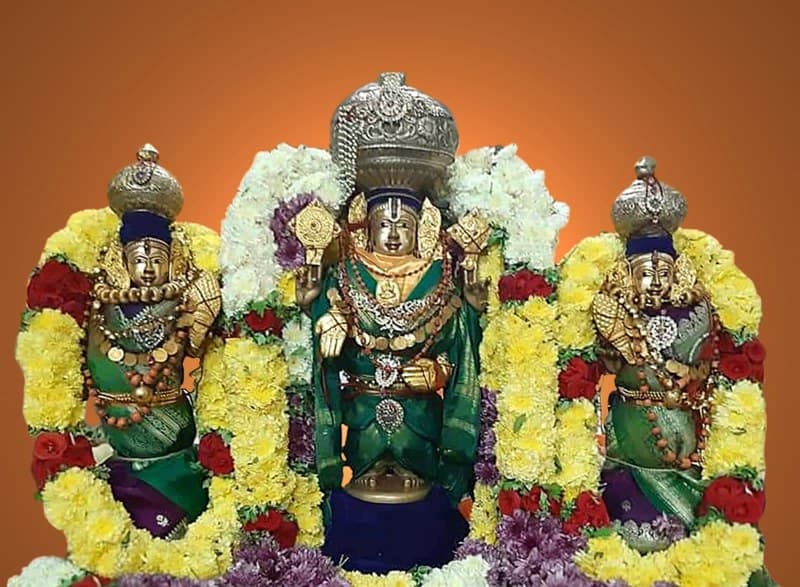 Utsava murti with garlands